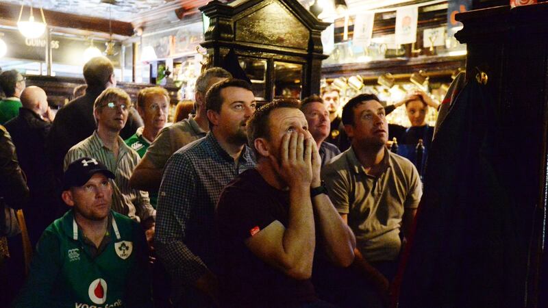 Ireland supporter watch the Ireland v New Zealand World Cup quarter-final  in Doheny & Nesbitt’s on Dublin’s Baggot Street in October. Photograph:   Alan Betson/The Irish Times