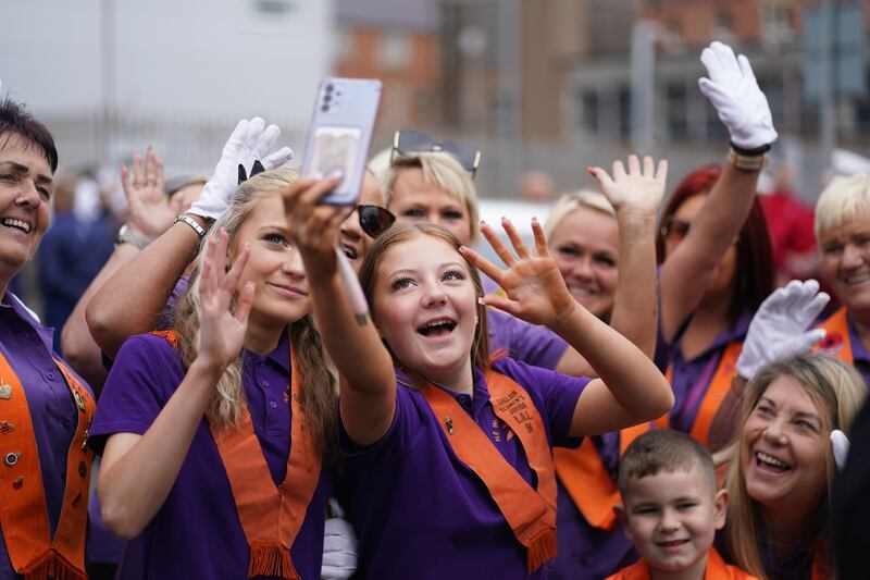 People gather at Carlisle Circus in Belfast ahead of an Orange Order parade. Photograph: Brian Lawless/PA Wire