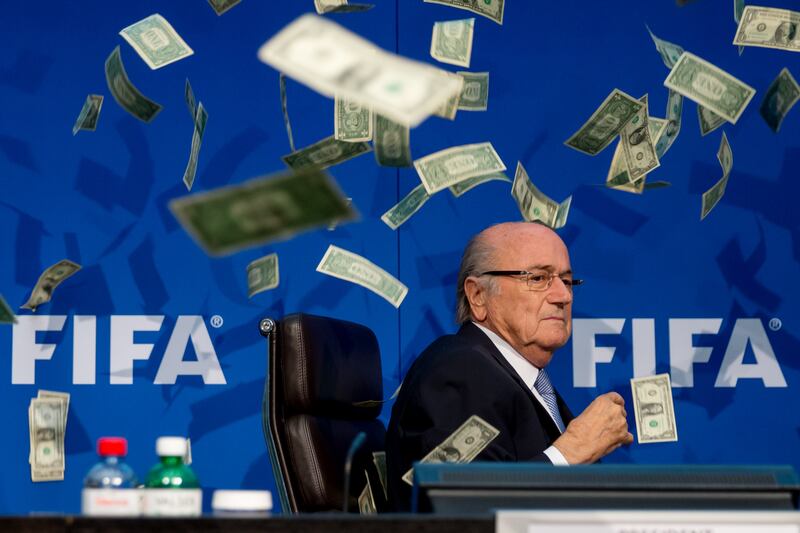 Fifa's then president, Sepp Blatter, after comedian Simon Brodkin threw cash at him in 2015. Photograph: Philipp Schmidli/Getty Images