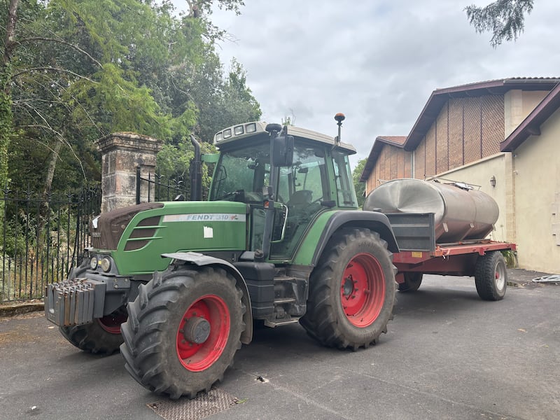 The tractor used by Damien Barton Sartorius to help fight Bordeaux wildfire was back in service as a vine irrigator on Friday. Photograph: Naomi O'Leary