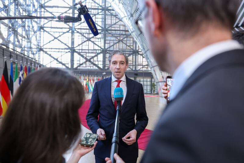 Simon Harris speaking with members of the media in Brussels on Monday. Photograph: Omar Havana/Bloomberg