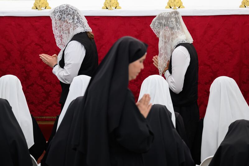 Worshippers attend the consecrations ceremony at the International Seminary of St Pius X on Wednesday in Econe, Switzerland. Photograph: Harold Cunningham/Getty