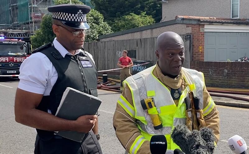 Assistant Commissioner of the London Fire Brigade Patrick Goulbourne (right) speaks at a press conference at the scene following a blaze at a block of flats in Dagenham on Monday. Photograph: Marc Ward/PA Wire