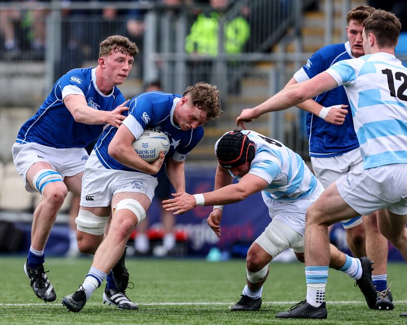 St Marys' Max Egan carries with Sean Thornton as he comes up against Geoffrey Wall of Blackrock College during Leinster Schools Senior Cup final replay in Donnybrook on March 23rd. Photograph: Ben Brady/Inpho