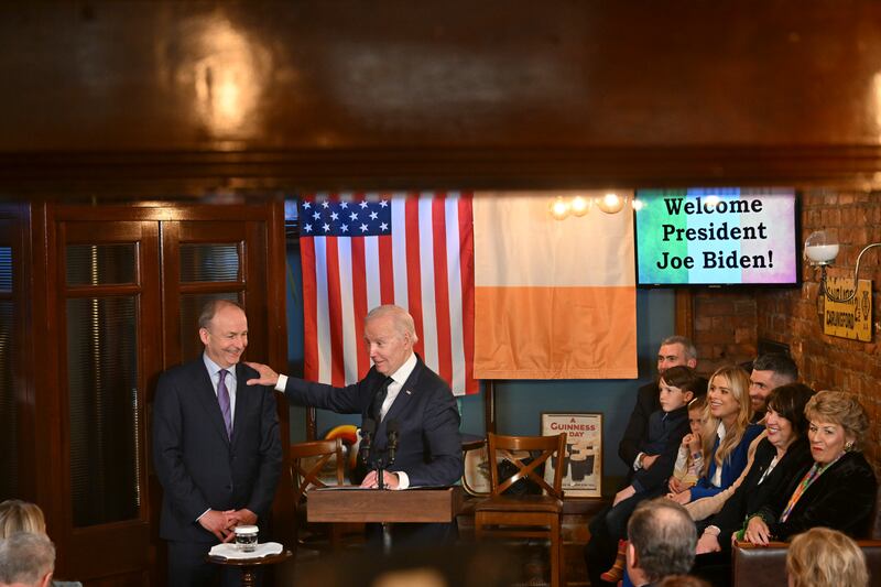 US president Joe Biden gestures to Tánaiste  Micheál Martin at the Windsor Bar and Restaurant in Dundalk, on the second day of his visit to Ireland.  Photograph: The New York Times