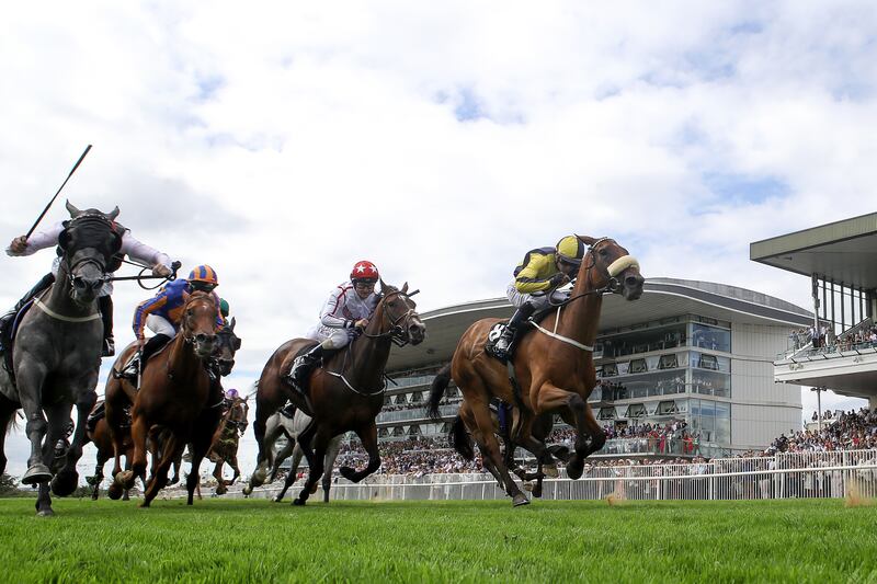 Ronan Whelan on Surrounding comes home to win the Arthur Guinness Irish EBF Corrib Fillies' Stakes at Galway. Photograph: Laszlo Geczo/Inpho