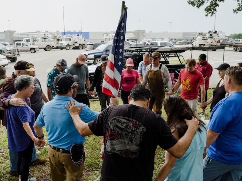 A group gathers to pray for those missing and confirmed dead after the Guadalupe River flooded in Kerrville, Texas at the weekend. Photograph: Carter Johnston/The New York Times
