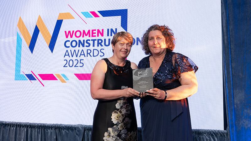 Susan Cormican, awards judge, presents the excellence in project management award to Patricia Barrett, Rogerson Reddan