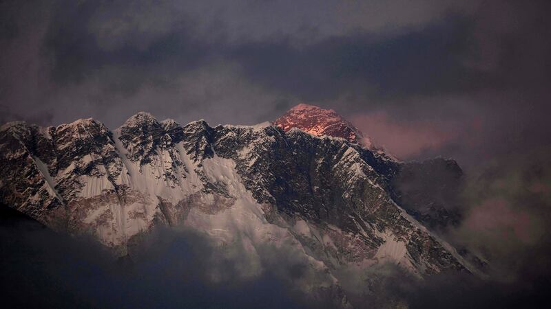 Sun sets  on Mount Everest seen  behind Mount Nuptse. Photograph: AP