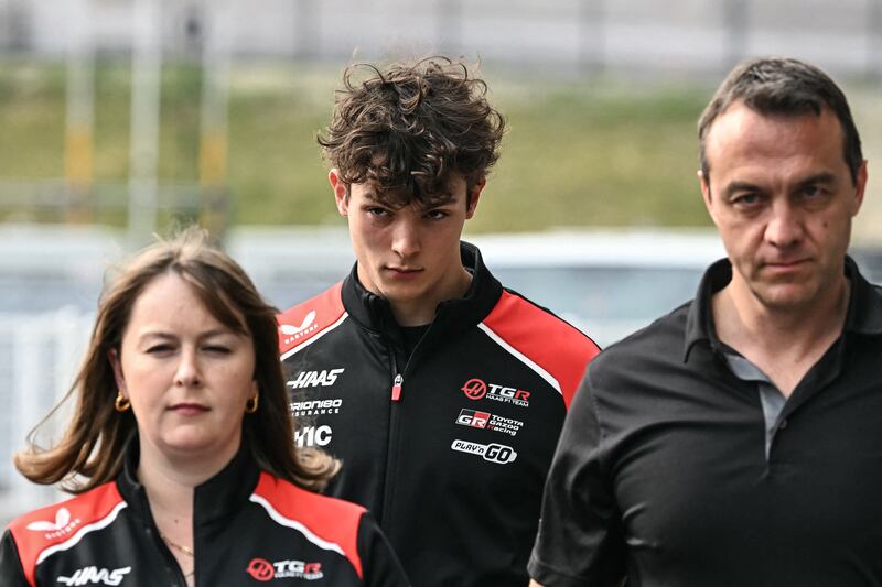 Haas driver Oliver Bearman walks back to the paddock after crashing. Photograph: Toshifumi KITAMURA / AFP via Getty Images
