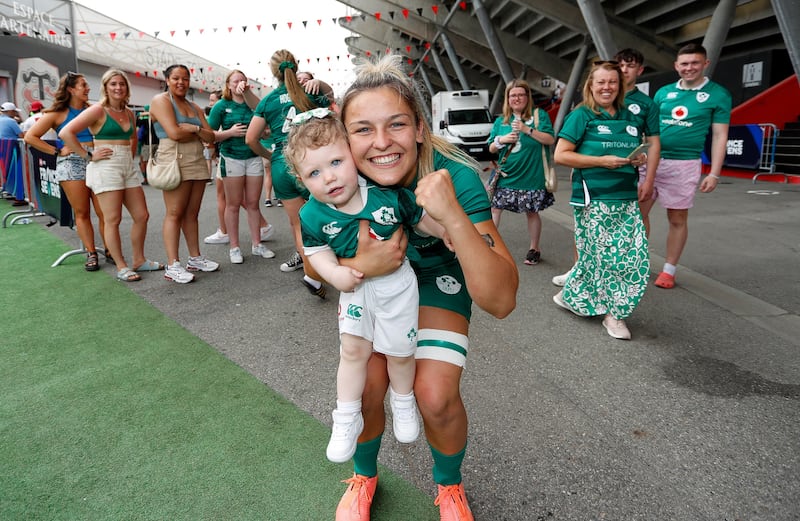 Ireland’s Erin King with a young supporter after the game. Photograph: Martin Seras Lima/Inpho