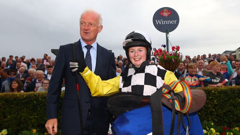 Jody Townend celebrates with Great White Shark’s  trainer Willie Mullins . Photograph: James Crombie/Inpho