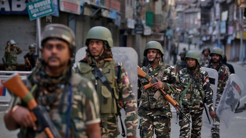 Indian security forces personnel patrol the streets of Kashmir’s capital,  Srinagar. Photograph: Danish Ismail