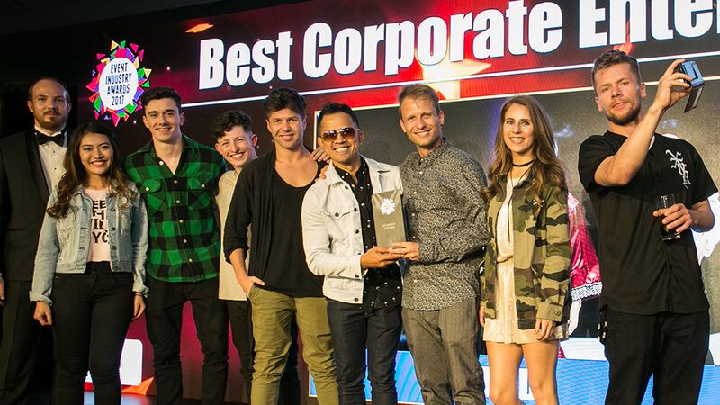 Declan Maxwell, Restaurant Manager, Luna Restaurant presents the Best Event Infrastructure Provider award to Gràinne Walker, Magnum Events.