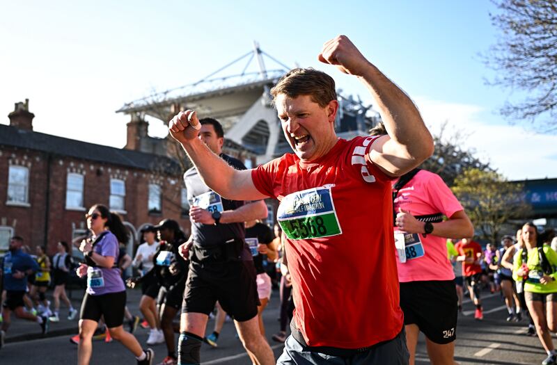 David Campbell and other participants pass Croke Park during the race. Photograph: Sam Barnes/Sportsfile