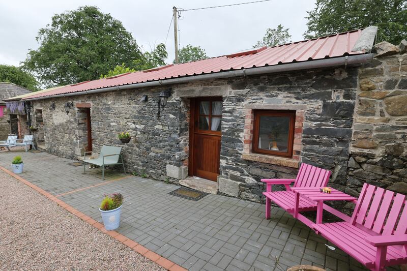 The couple turned three outhouses into self-catering cottages