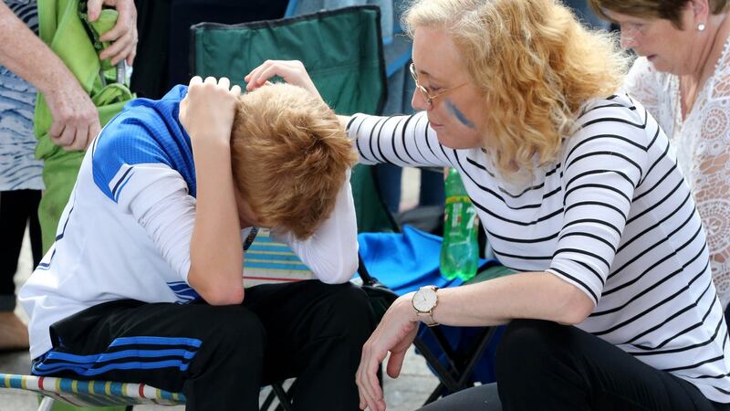 Jacintha Bowe consoles her son Luke. Photograph: Patrick Browne
