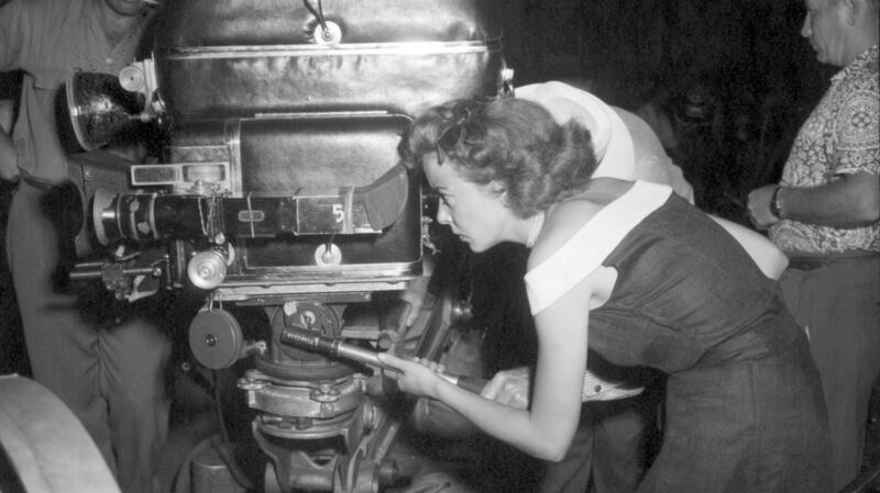 Ida Lupino directs one of the scenes from her picture, Mother of a Champion. Undated photograph.