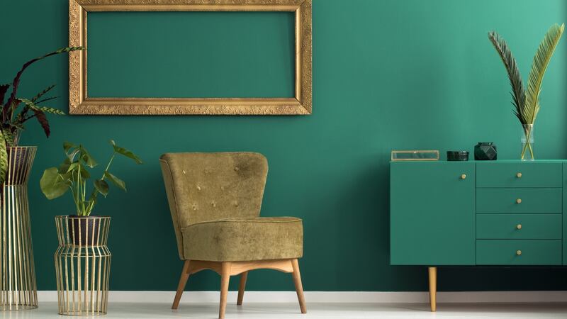 Luxurious green living room interior.