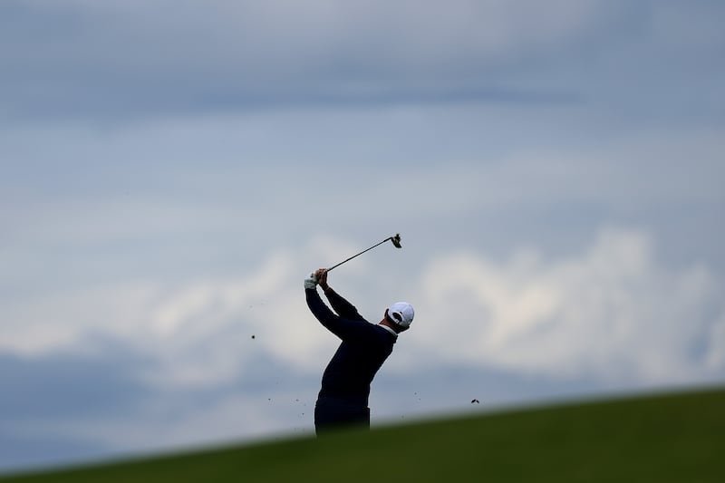 Rory McIlroy plays a shot on the 15th hole during his second round at Royal Portrush. Photograph:  Alex Slitz/Getty Images