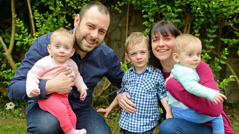 Marc Tanguy and Mary McCluskey with their children Seb, Zoe and Eve, at home in Castleknock, Co. Dublin.  Photograph: Eric Luke