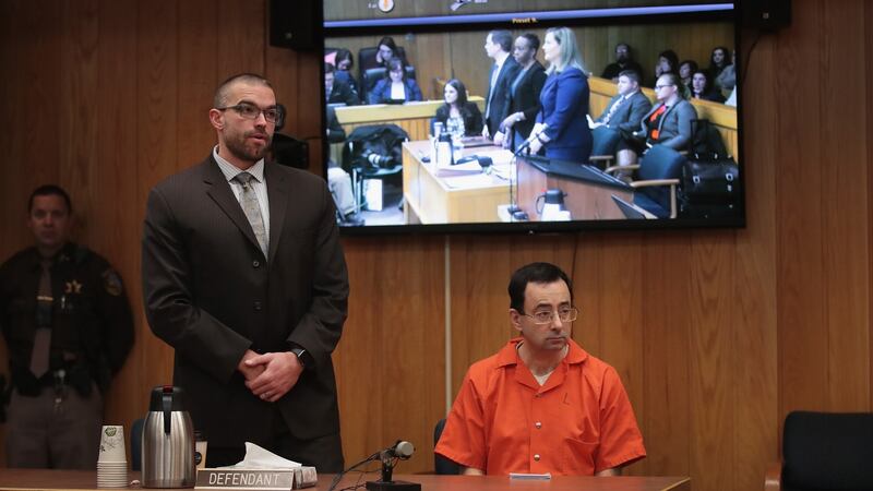 Larry Nassar sits with his attorney Matt Newburg as he is sentenced by Judge Janice Cunningham at Eaton County Circuit Court on February 5th, 2018. Photo: Scott Olson/Getty Images