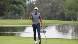 Johnson finds his path clear as he wins by five shots from McIlroy