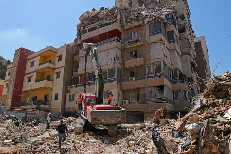 First responders inspect the rubble of a collapsed building following an Israeli air strike a day earlier in Beirut's southern suburb of Haret Hreik on Thursday. Photograph: Anwar Amro/AFP via Getty