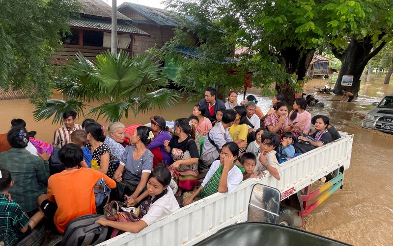 Flood victims evacuate the area on a truck in Pyinmana, Naypyidaw, Myanmar on Friday. Photograph: Nyein Chan Naing/EPA