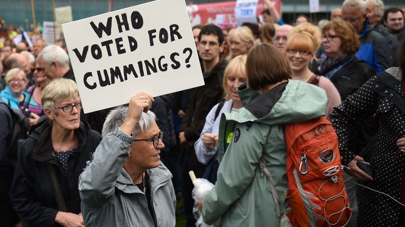 A demonstrator holds up a placard at a protest n Manchester against the move to suspend parliament in the final weeks before Brexit. Photograph:  Getty