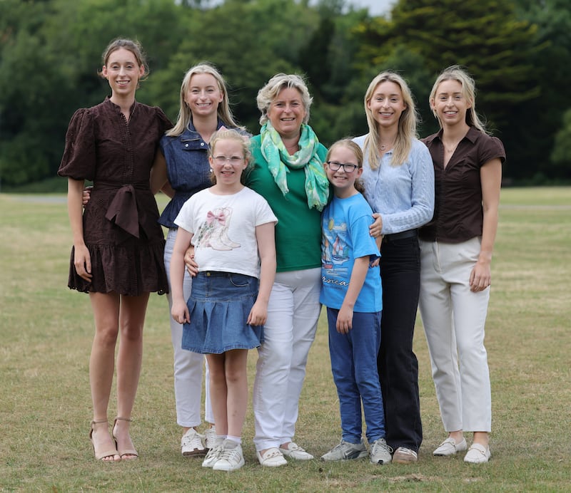 Phil Kane-Flynn (centre) from Mullingar is the mother of three sets of twins: from left, Rebecca and Emma (28); Alecia and Mabie Jane (10); and Tara and Emer (27). Photograph: Bryan O’Brien