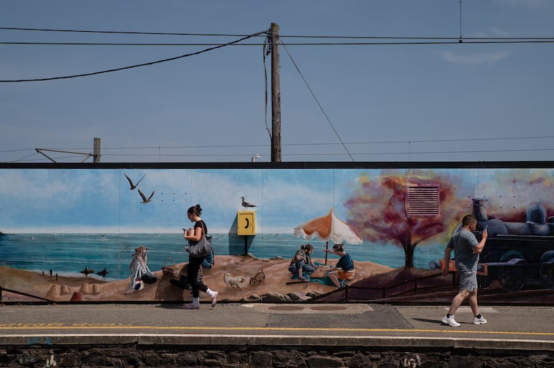 People walking in Greystones during the heatwave. Photo: Natalia Campos