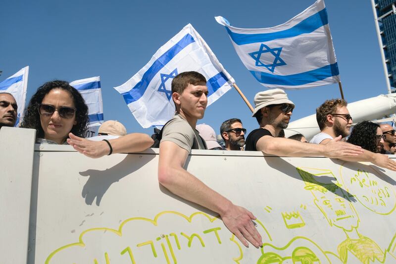 A protest against Mr Netanyahu's reforms  on the Yehudit Bridge in Tel Aviv. Photograph: Amit Elkayam/The New York Times
                      