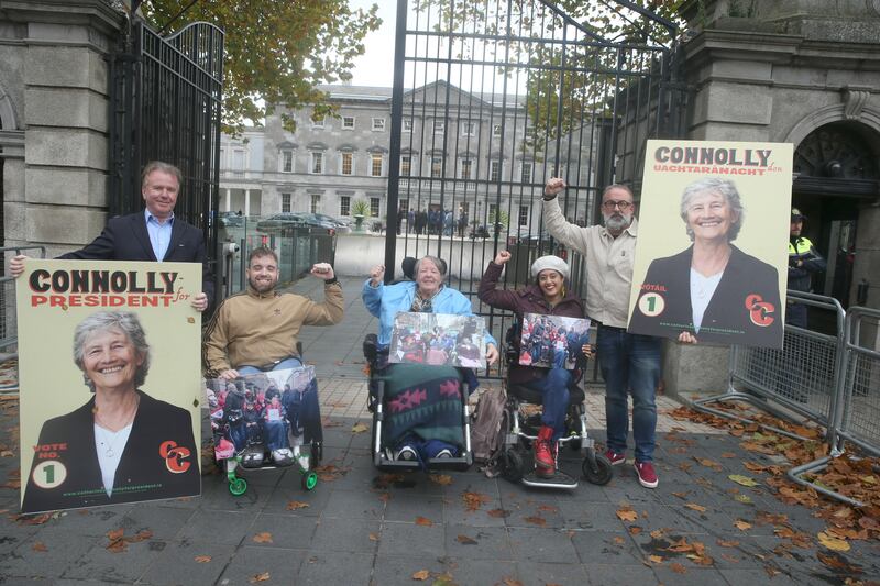 Bernard Mulvany, Graham Merrigan - disability activist, Dr Margaret Kennedy- disabled campaigner, Maryam Madani - Founder of Disability Power Ireland, and Senator Tom Clonan pictured outside Leinster House.
Photograph: Stephen Collins/Collins Photos