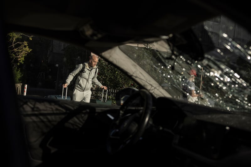 A resident retrieves their belongings from a building damaged in a missile strike on Tel Aviv, Israel, on March 24th. Photograph: Avishag Shaar-Yashuv/The New York Times