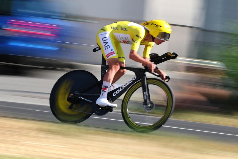 Yellow jersey holder Tadej Pogacar in action during Tuesday's time trial. Photograph: Anne-Christine Poujoulat/AFP via Getty Images