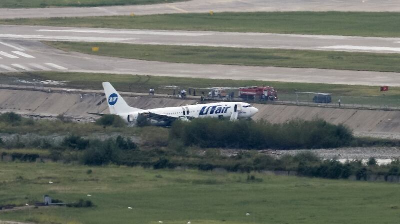 A Utair Boeing 737-800 passenger plane is seen after coming off an airport runway in Sochi, Russia. Photograph: Reuters.