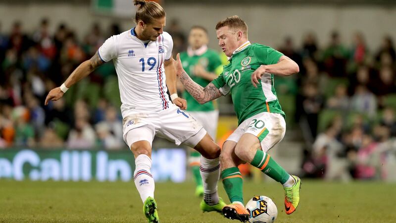 Jonny Hayes beats Rúrik Gíslason. Photo: Ryan Byrne/Inpho