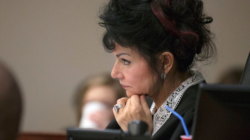 Judge Rosemarie Aquilina  listening to survivor statements during the sentencing phase for  Nassar. She said it was her   “honour and privilege” to sentence him.  Photograph: EPA/Rena Laverty