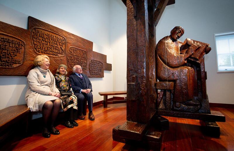 President Michael D Higgins and Sabina  look at Stuart’s work Pangur Bán. Photograph: Tom Honan/The Irish Times