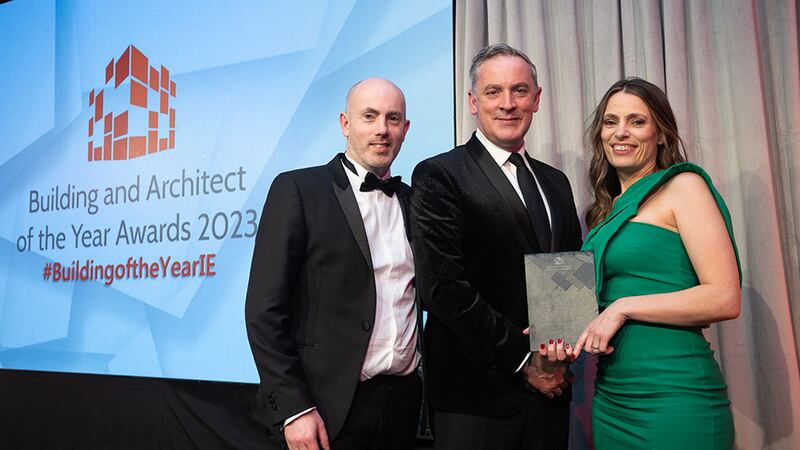 Thomas Vitkus, founder, Handlecraft, presents the single house building of the year award to Martin Marshall and Roisin McCann, Marshall McCann Architects