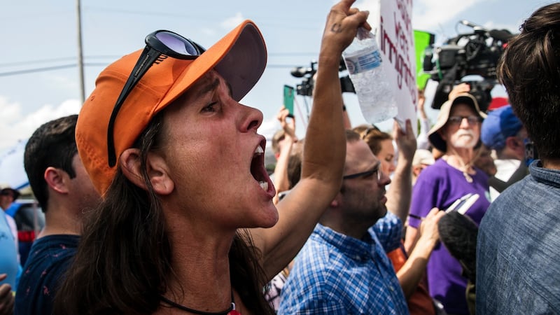 A protester outside the Homestead facility in Florida, where migrant children are housed. Photograph: Scott McIntyre/The New York Times