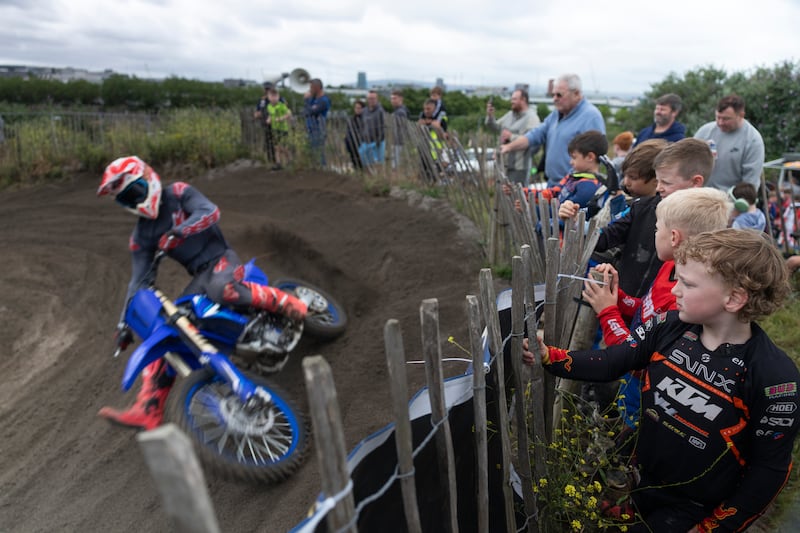 Youngsters watch the motorcycle racing at Alfie Byrne Road. Photograph: Chris Maddaloni/The Irish Times
