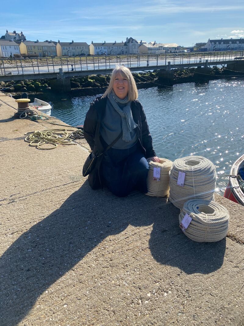 Fleece traced from farm to fashion: Rathlin Wool grown on Rathlin Island. Alison Gault sits with the ropes at the harbour