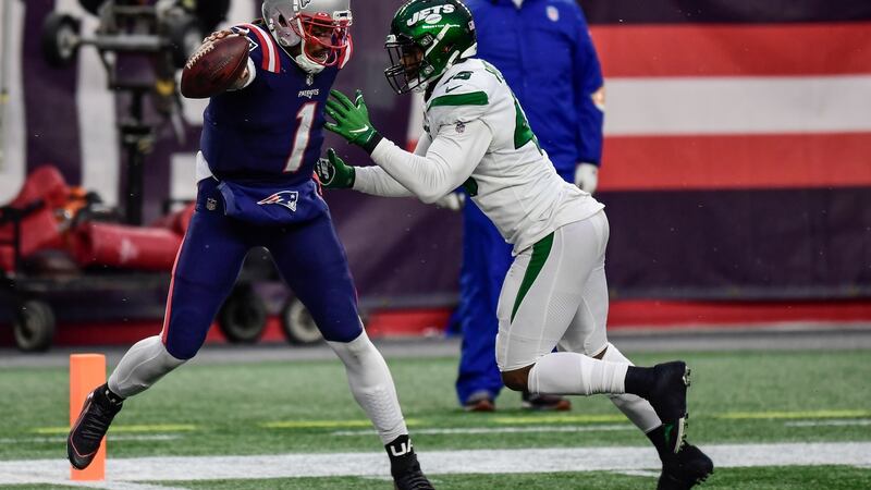 Cam Newton catches a touchdown pass during the New England Patriots’ win over the New York Jets. Photograph: Billie Weiss/Getty