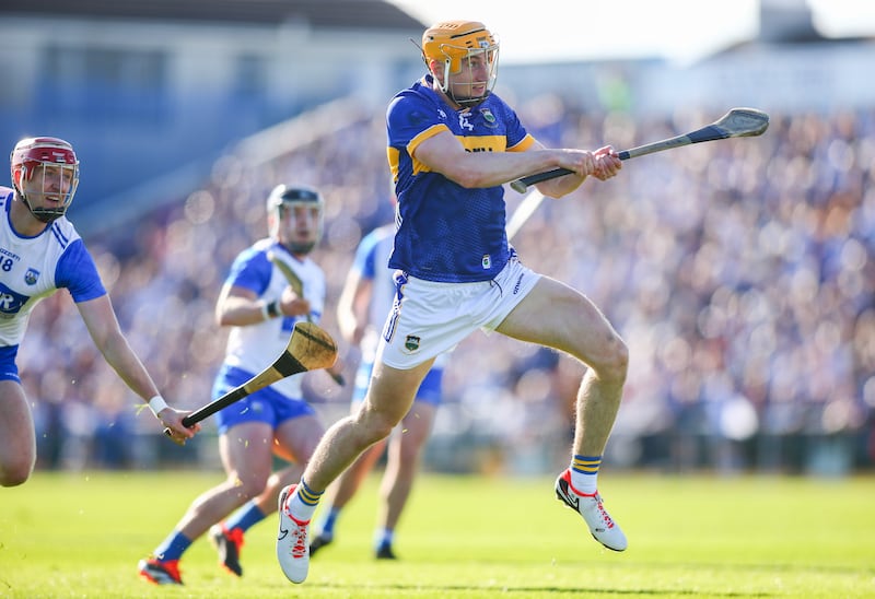 Tipperary's Mark Kehoe scores a point in the Munster GAA Senior Hurling Championship against Waterford. Photograph: Ken Sutton/Inpho
