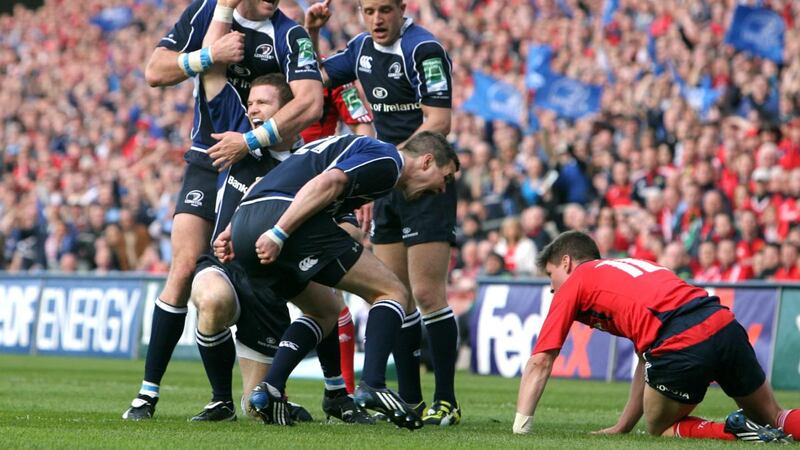 Leinster’s Johnny Sexton roars at Munster’s Ronan O’Gara  after Gordon D’Arcy’s try in the Heineken Cup semi-final at Croke Park in May 2009. Photograph:  James Crombie/Inpho