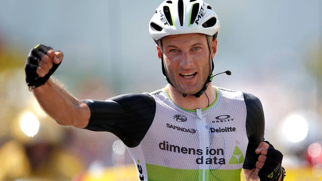 British Team Dimension Data rider Stephen Cummings celebrates as he crosses the finish line to win the seventh stage of the Tour de France between L’Isle-Jourdain and Lac de Payolle. Photograph: Yoan Valat/EPA