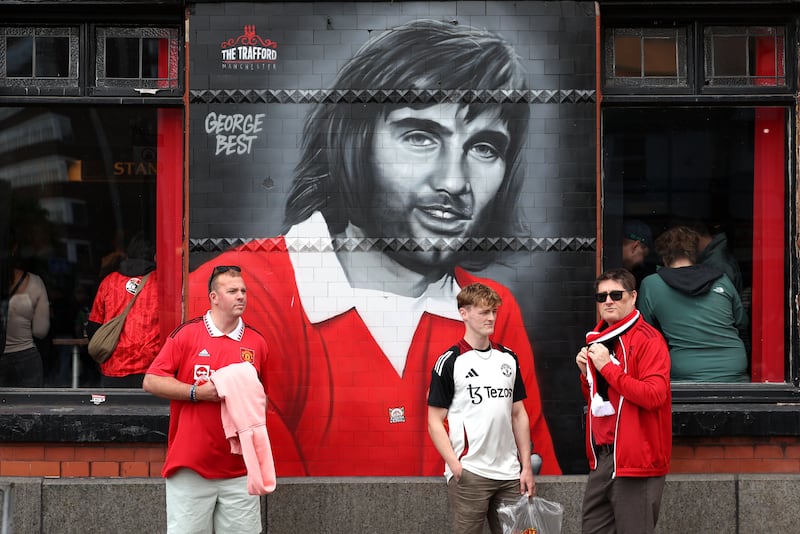 A George Best mural outside Old Trafford. Photograph: Getty Images