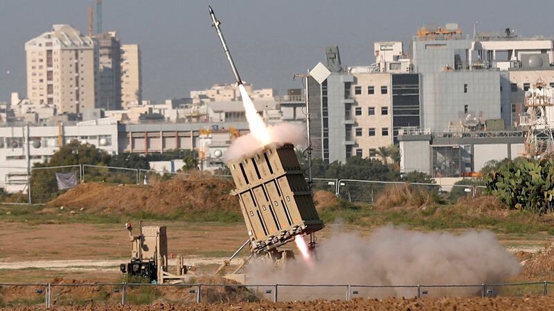 A view of an Iron dome missile system intercepting rockets reportedly fired from Gaza into Israel, near the city of Ashdod on Tuesday. Photograph: Atef Safadi/EPA